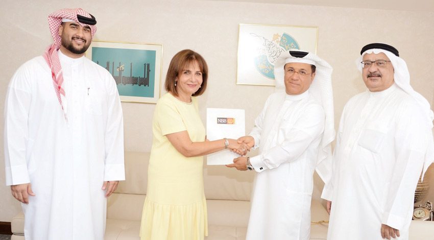 بنك البحرين الوطني يقدم دعمًا ماديا لجمعية حماية العمال الوافدين